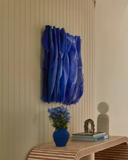 Hartley House — a cobalt-blue folded paint work styled in a home entryway
